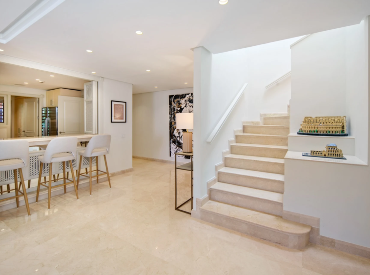 Internal staircase and breakfast bar between the living areas