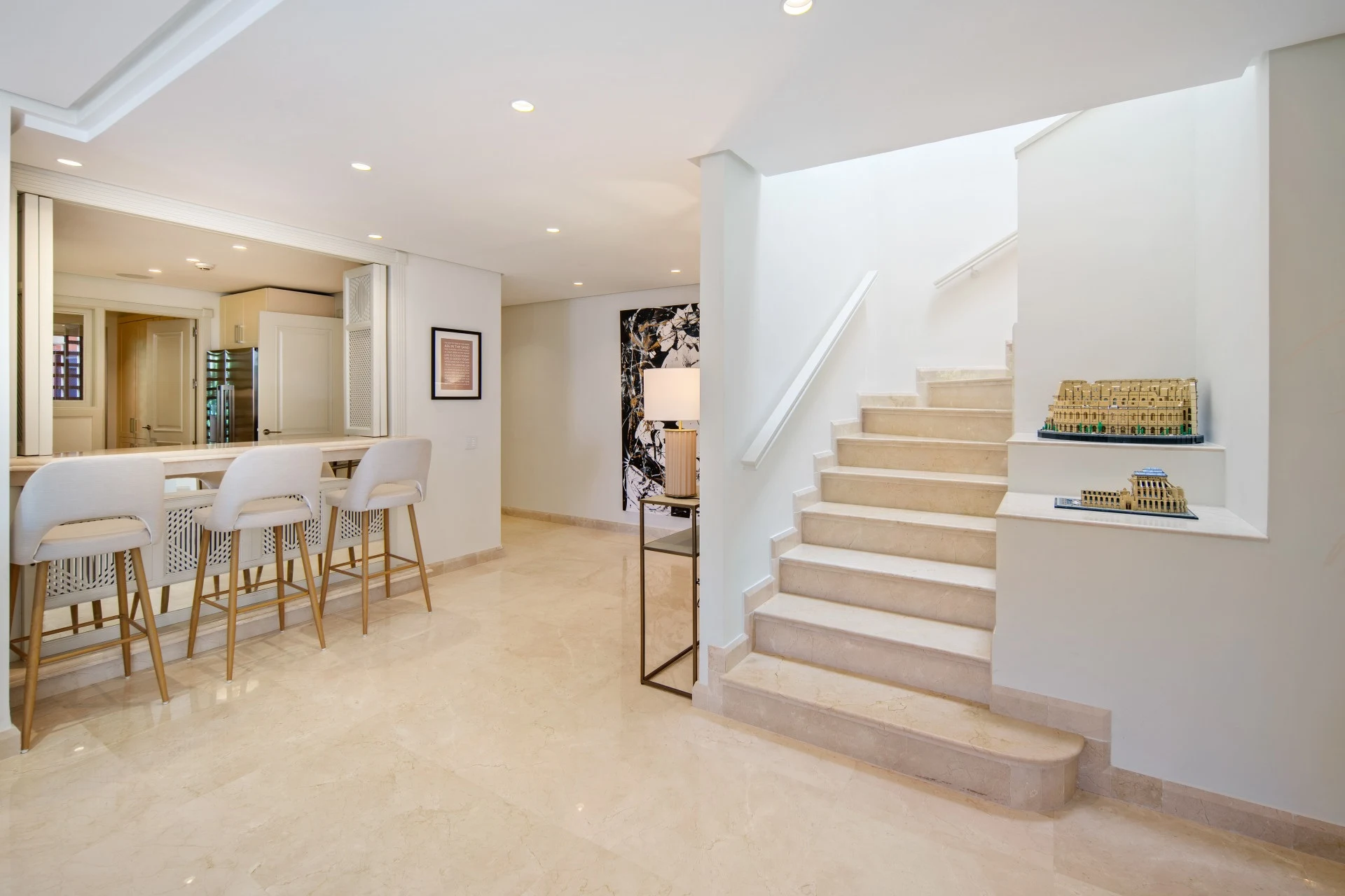 Internal staircase and breakfast bar between the living areas