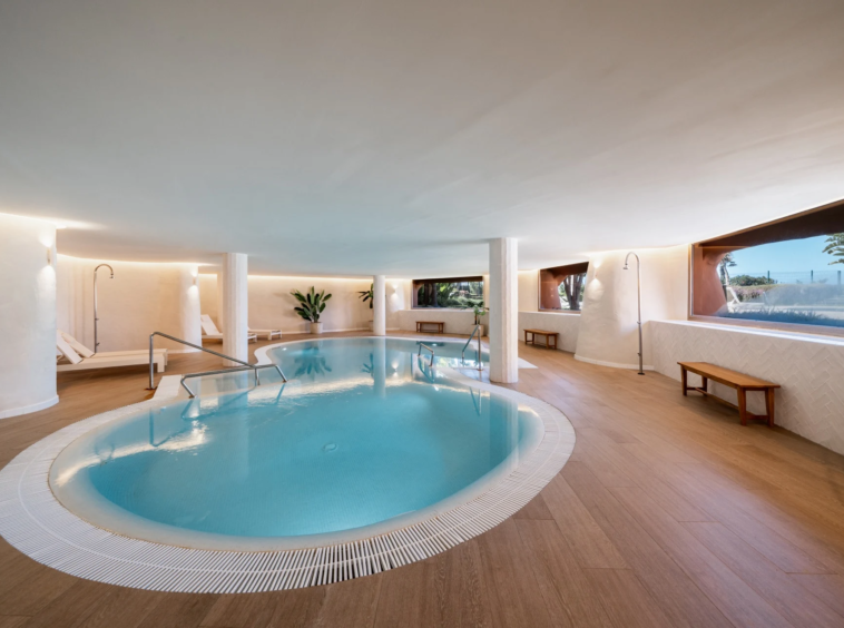 Communal indoor swimming pool with adjoining relaxation area