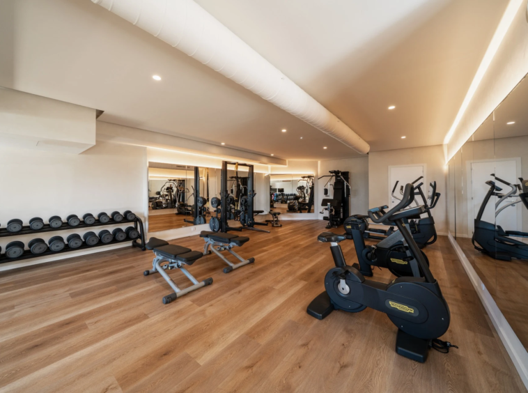 Community gym with cardio equipment and free weights