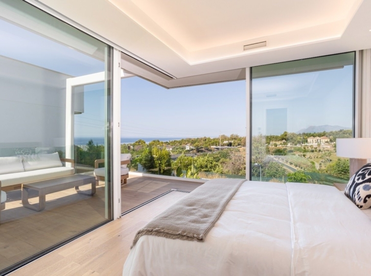 Representative bedroom opening to a terrace