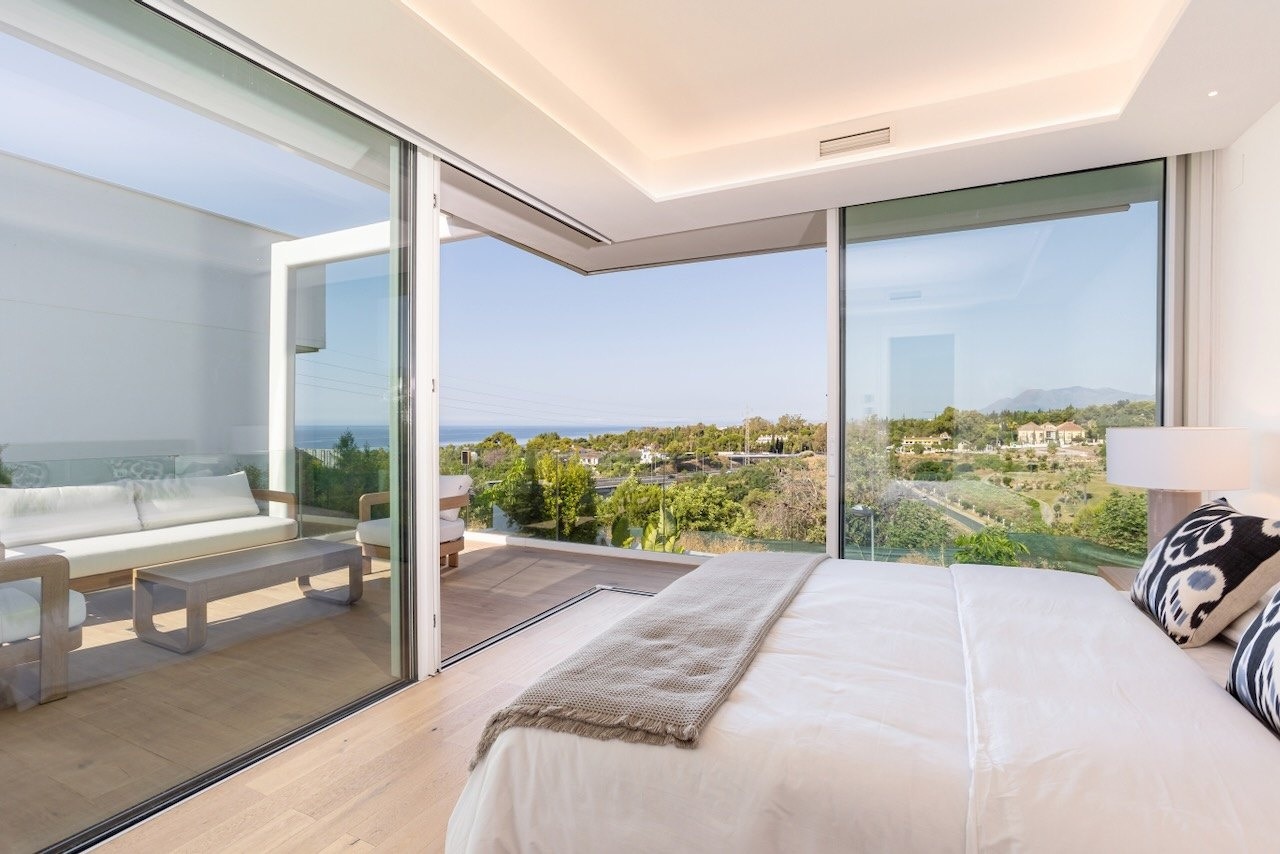 Representative bedroom opening to a terrace