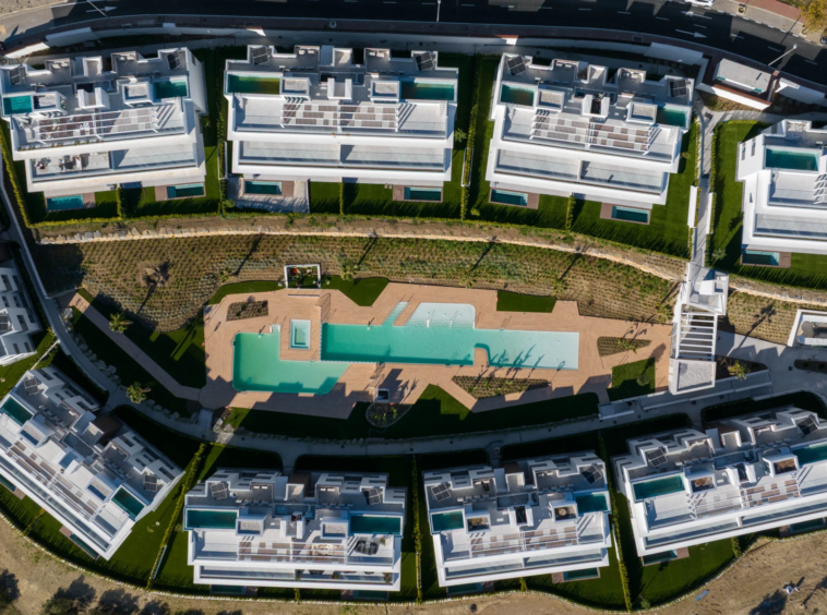 Communal gardens and swimming pool seen from above