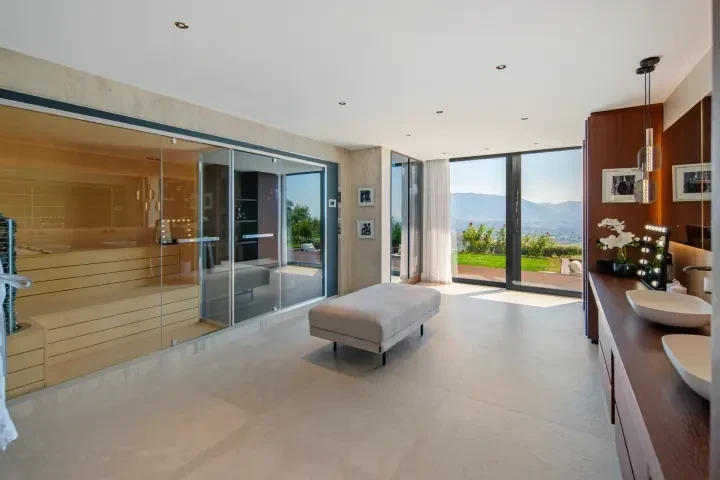 Bathroom with freestanding bathtub and terrace views in Marbella East