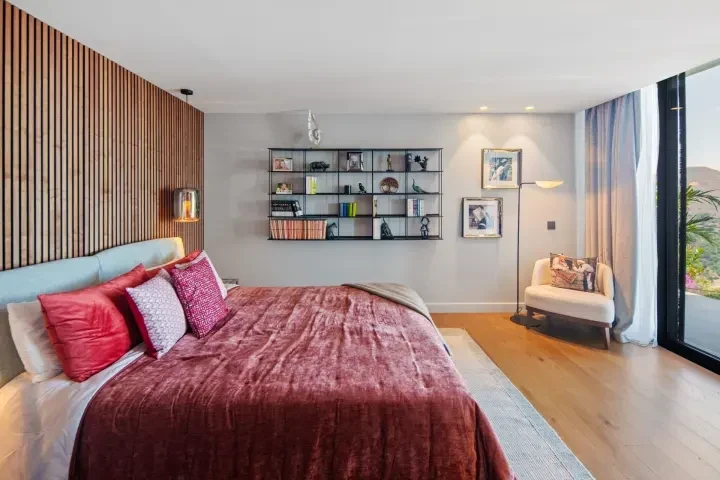 Bedroom with built-in shelving in Marbella East