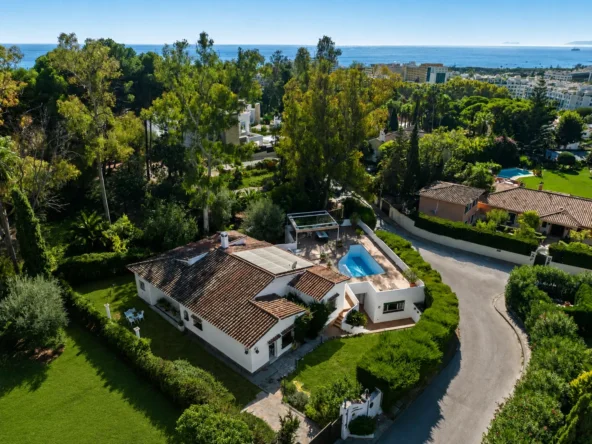 Aerial view of a Mediterranean villa with private pool in Marbella