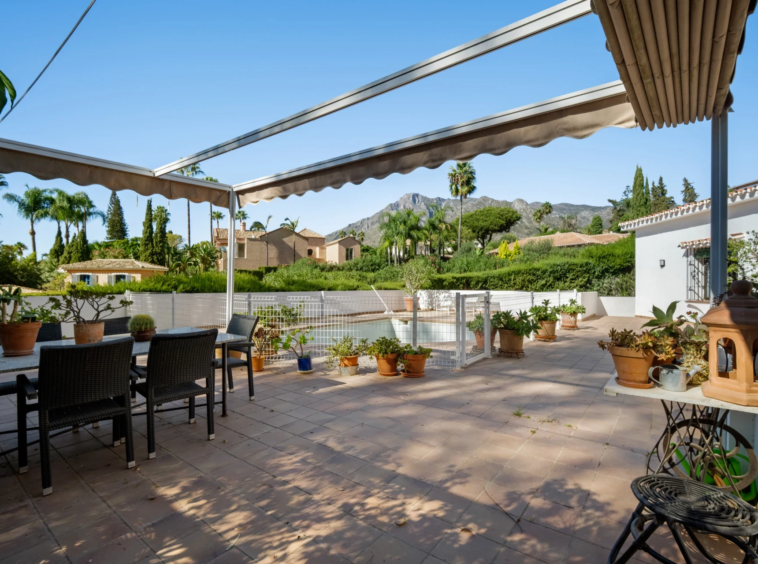 Shaded terrace beside the private pool