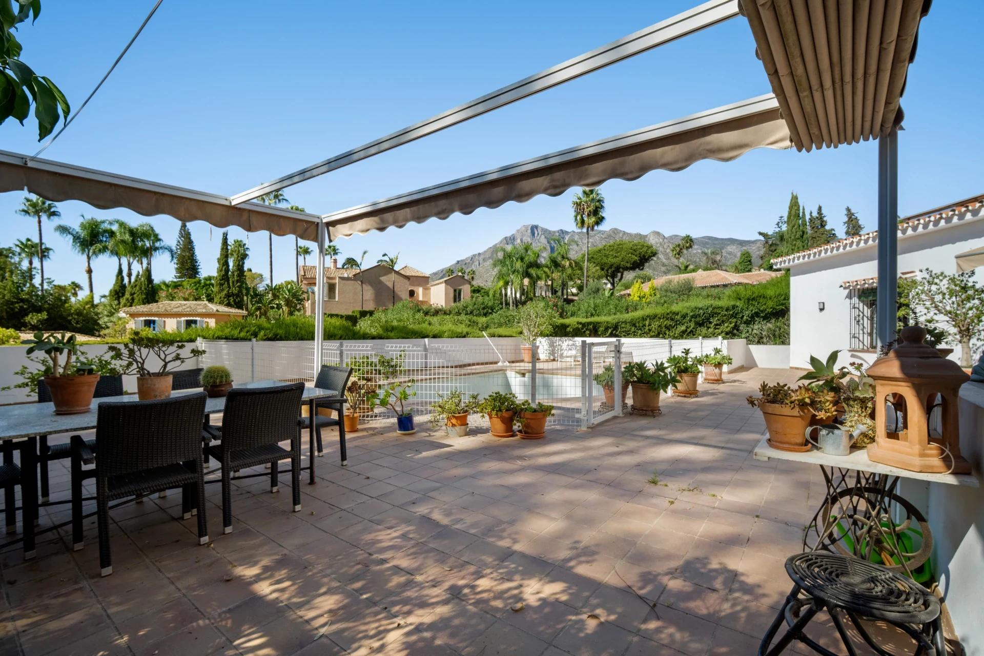 Shaded terrace beside the private pool