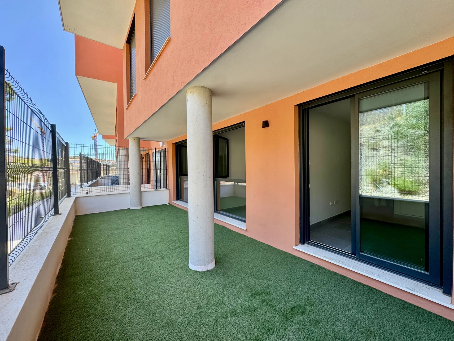Rear terrace with artificial grass