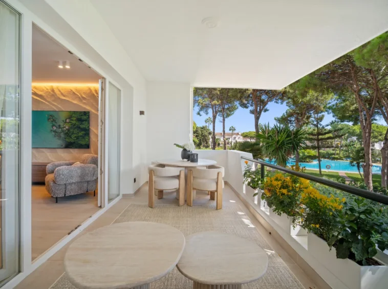 Covered terrace overlooking landscaped communal gardens