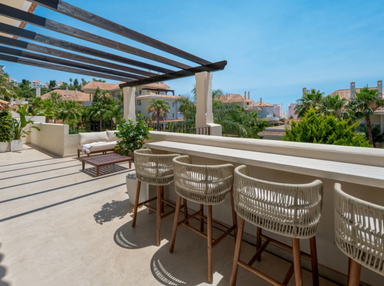 Outdoor dining area with sea views