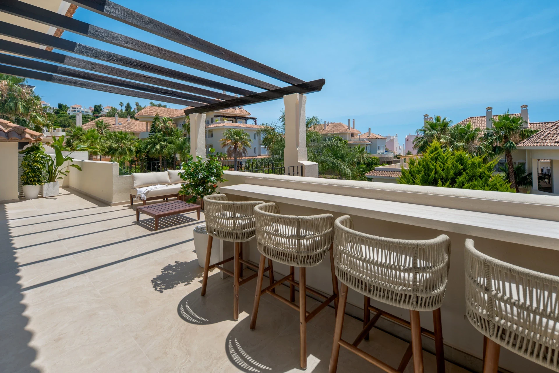 Outdoor dining area with sea views