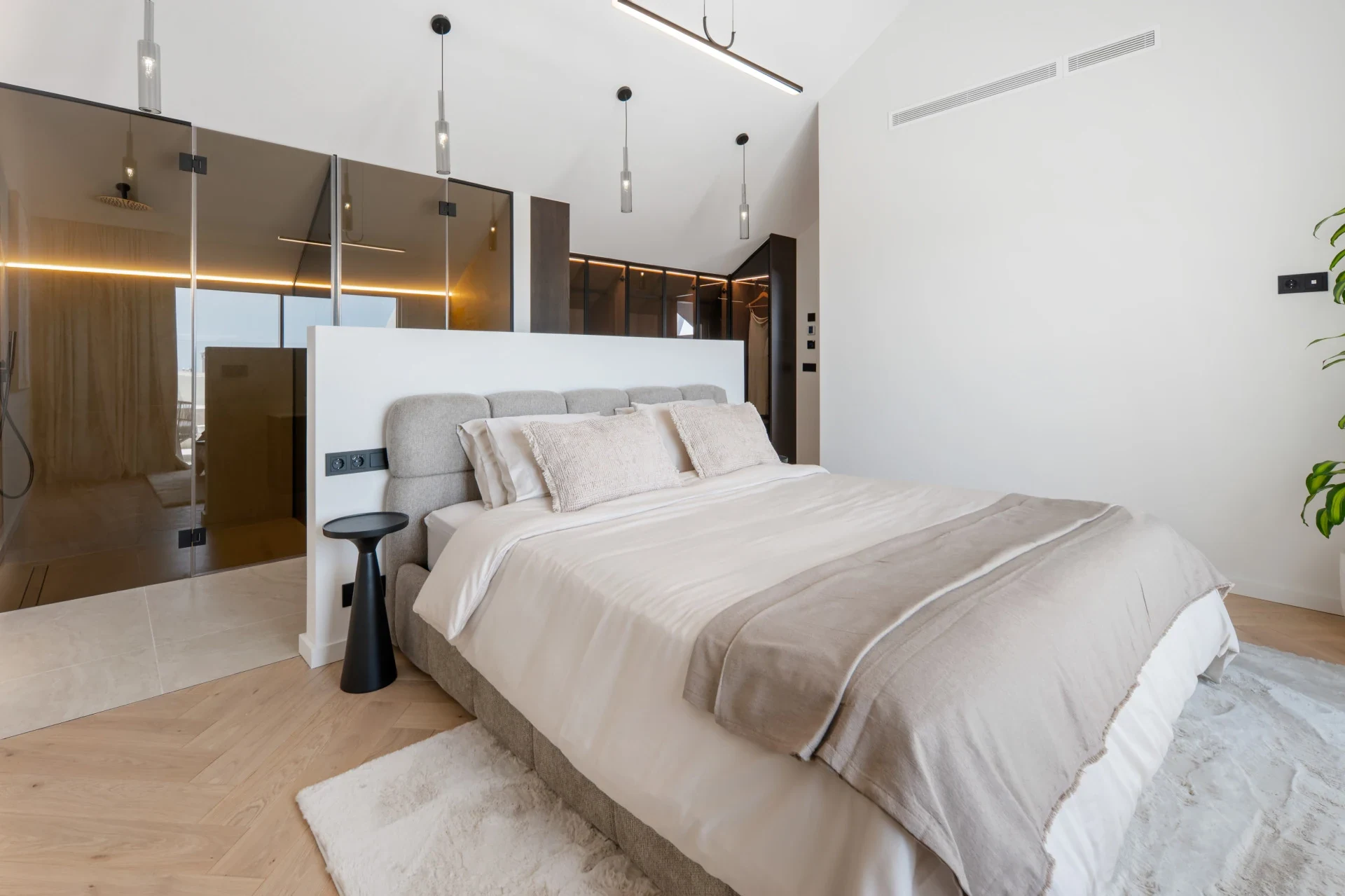 Principal bedroom with an open bathroom layout