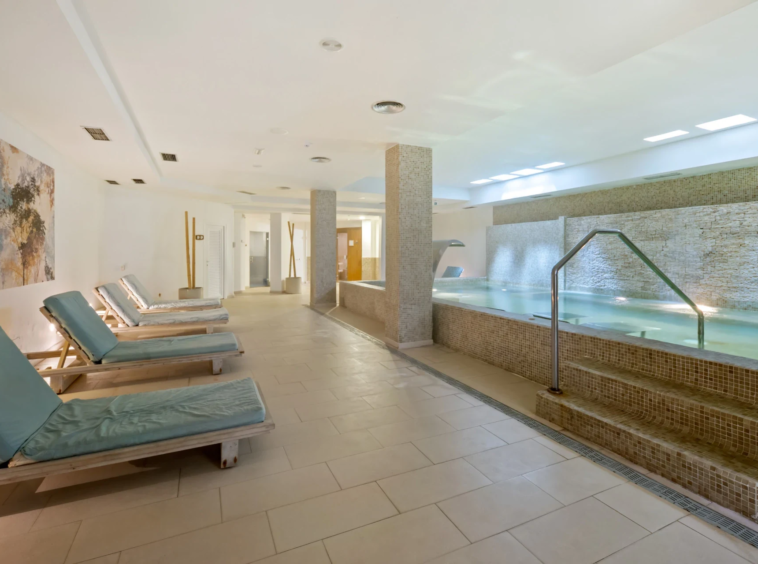 Communal indoor pool and spa area