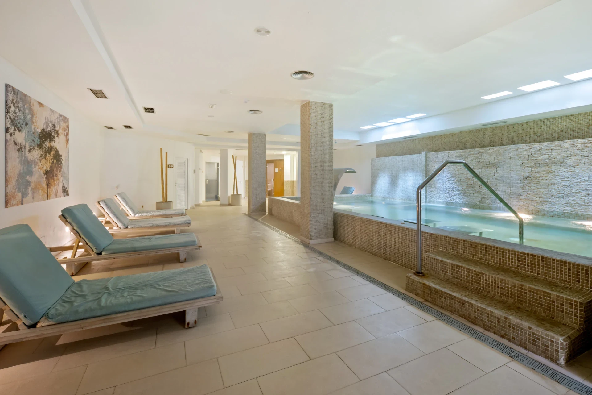 Communal indoor pool and spa area