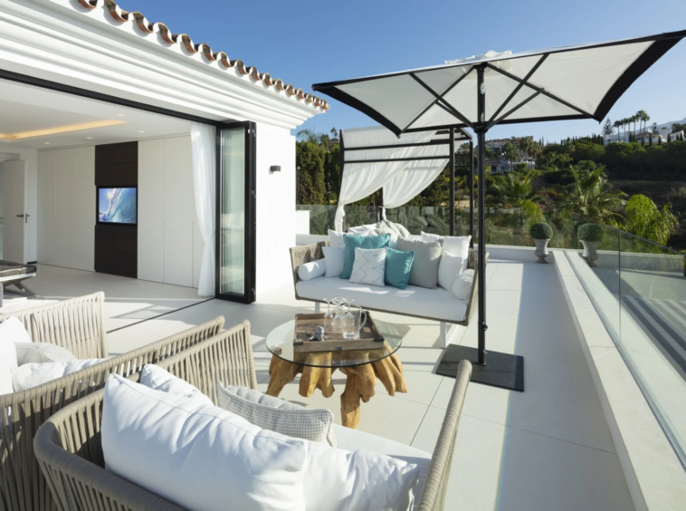 Wraparound terrace with outdoor seating