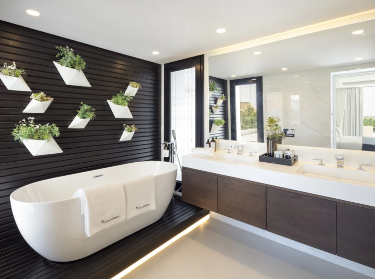Principal bathroom with freestanding bathtub and vanity