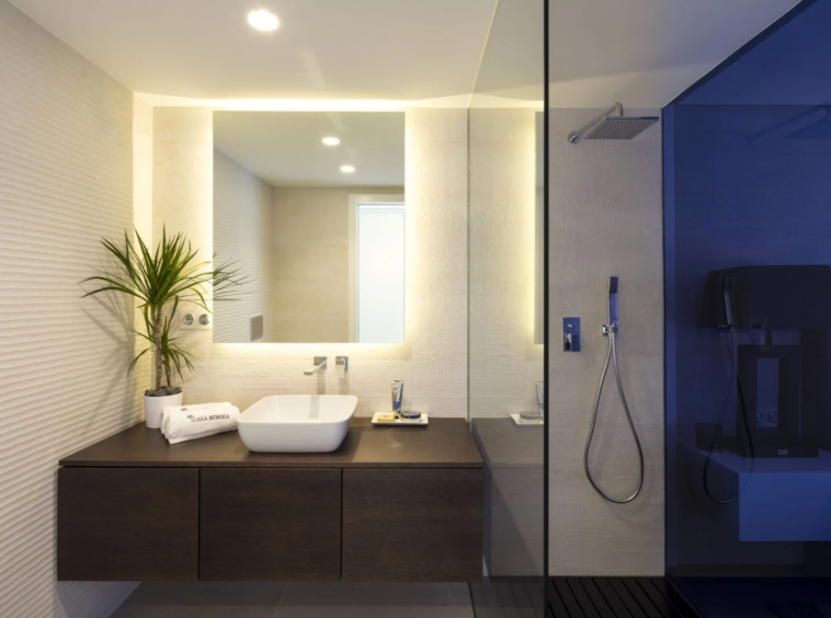 Guest bathroom with vanity and walk-in shower