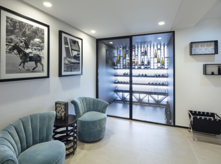 Wine display and storage area beside a seating nook
