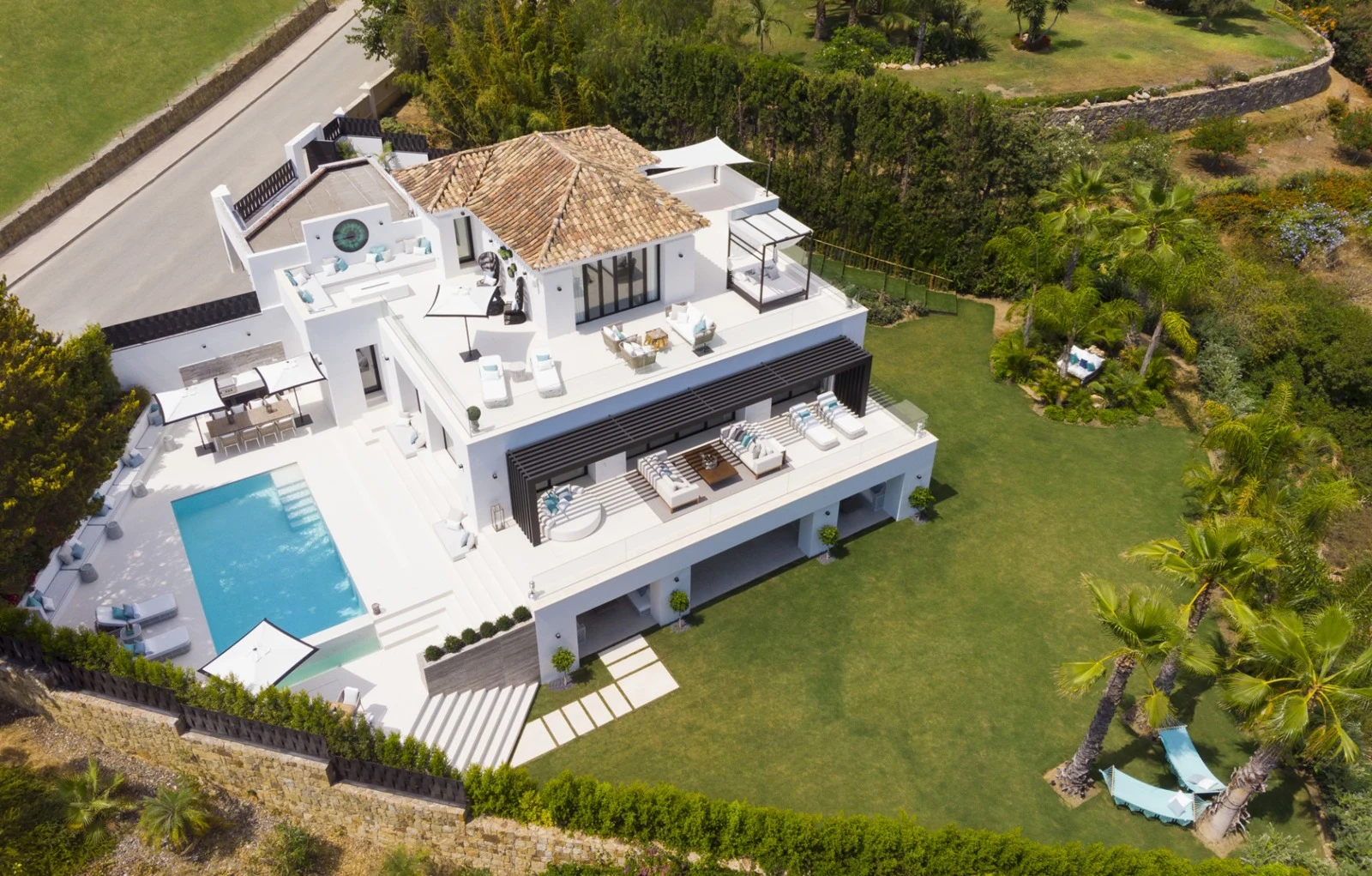 Elevated view of the villa, garden and private pool