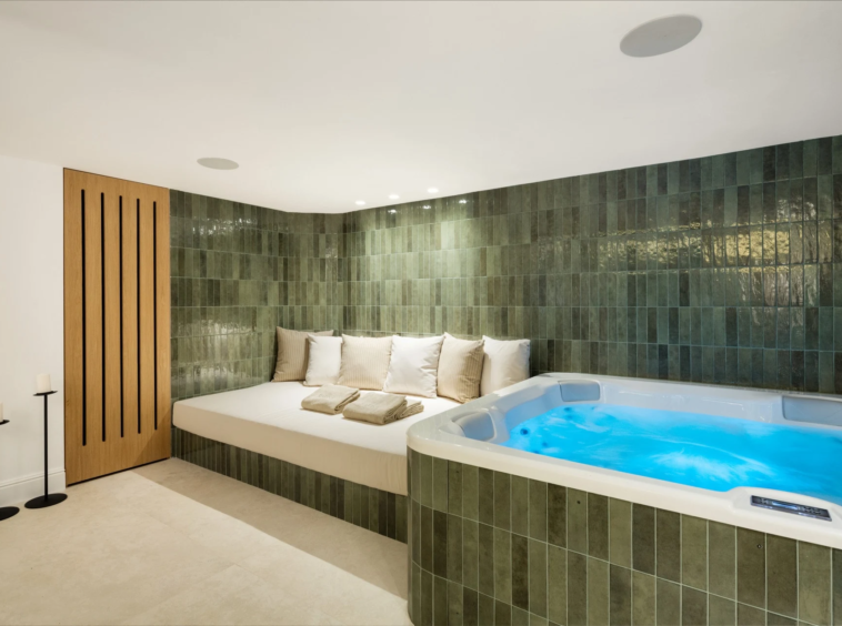 Wellness room with an indoor spa pool