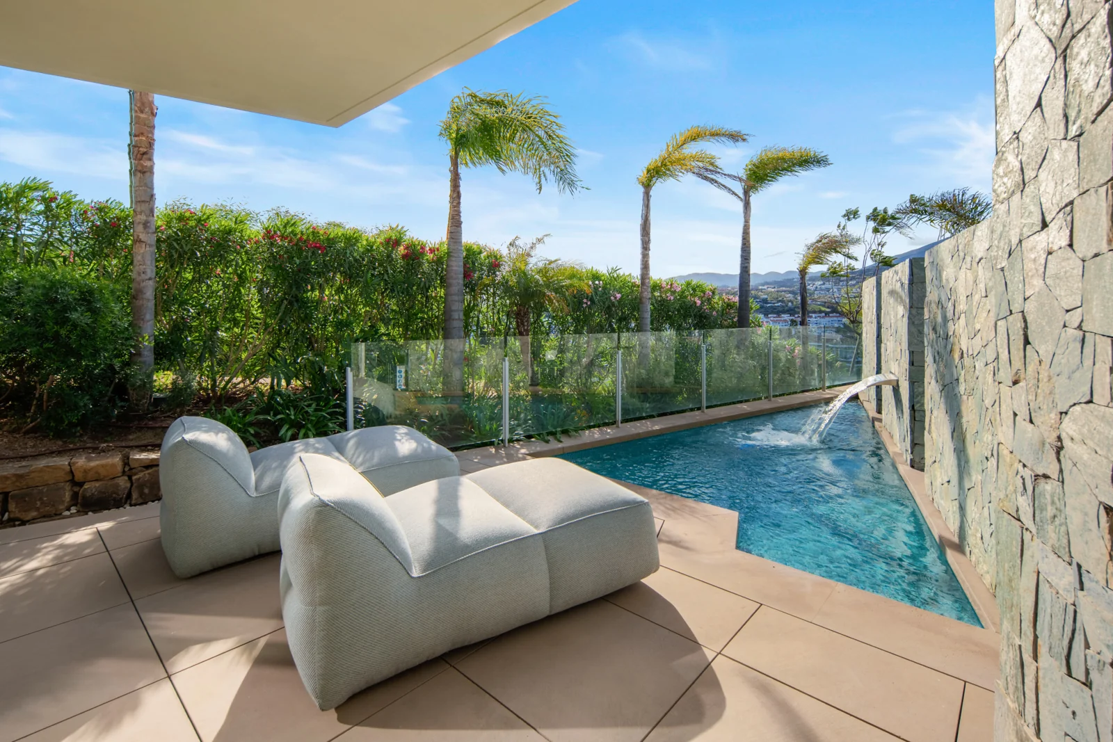 Private swimming pool beside the covered terrace