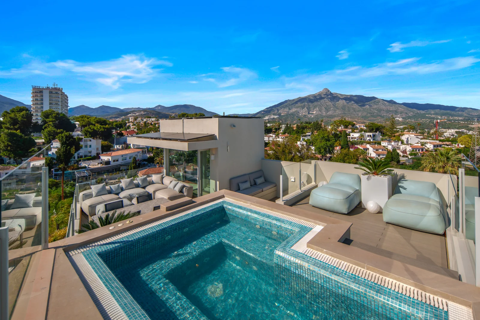 Rooftop jacuzzi and mountain views