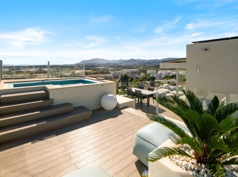 Rooftop terrace with open coastal views