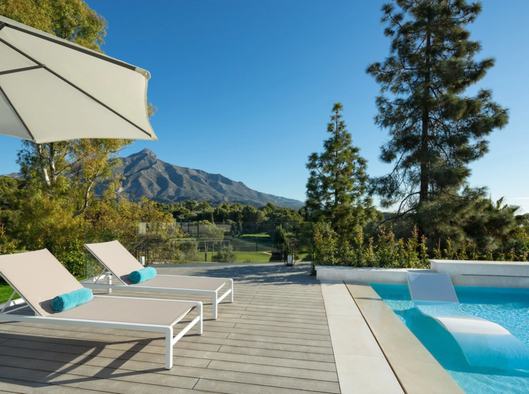 Private pool terrace overlooking the golf course and mountains