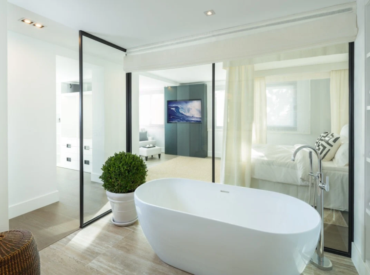 En-suite bathroom with freestanding bathtub