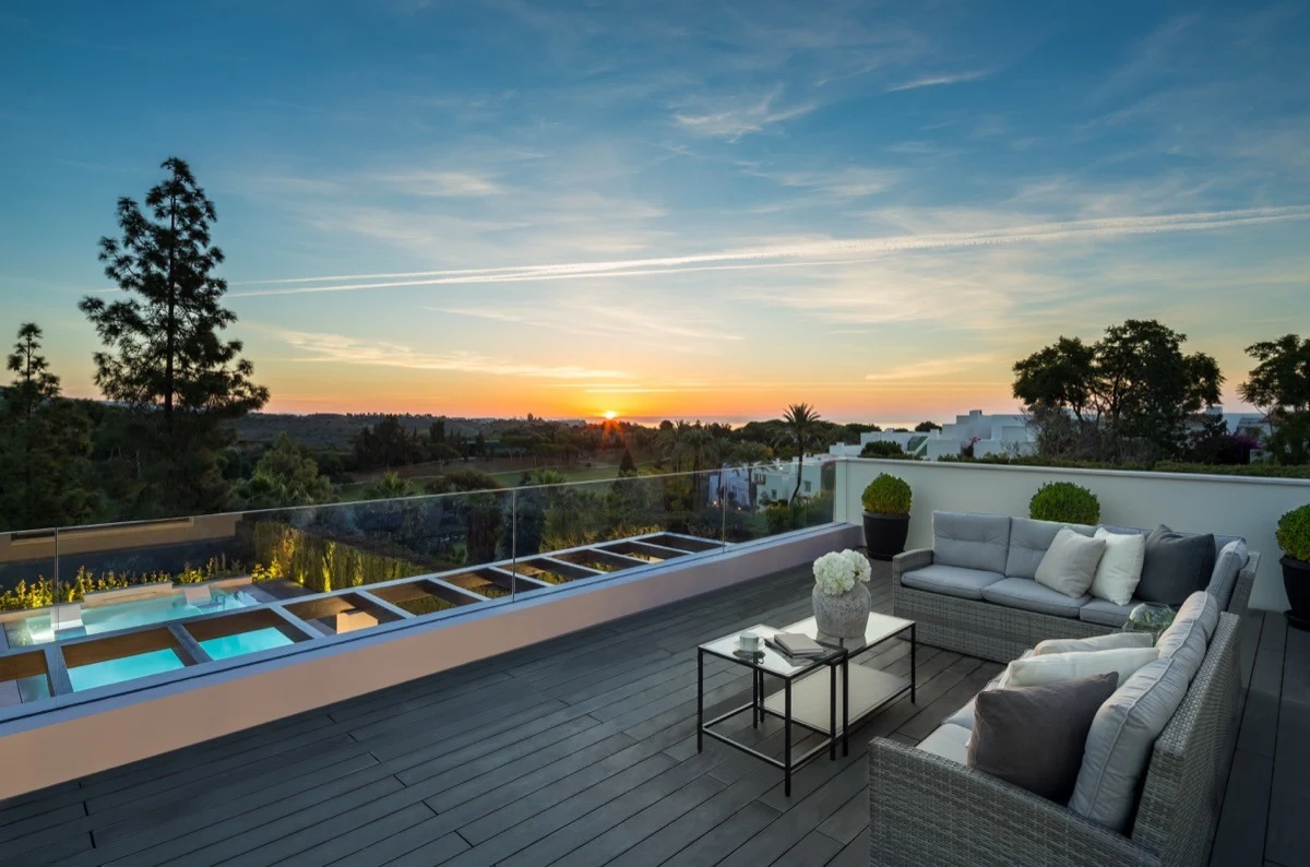 Upper terrace with views over the pool and golf course