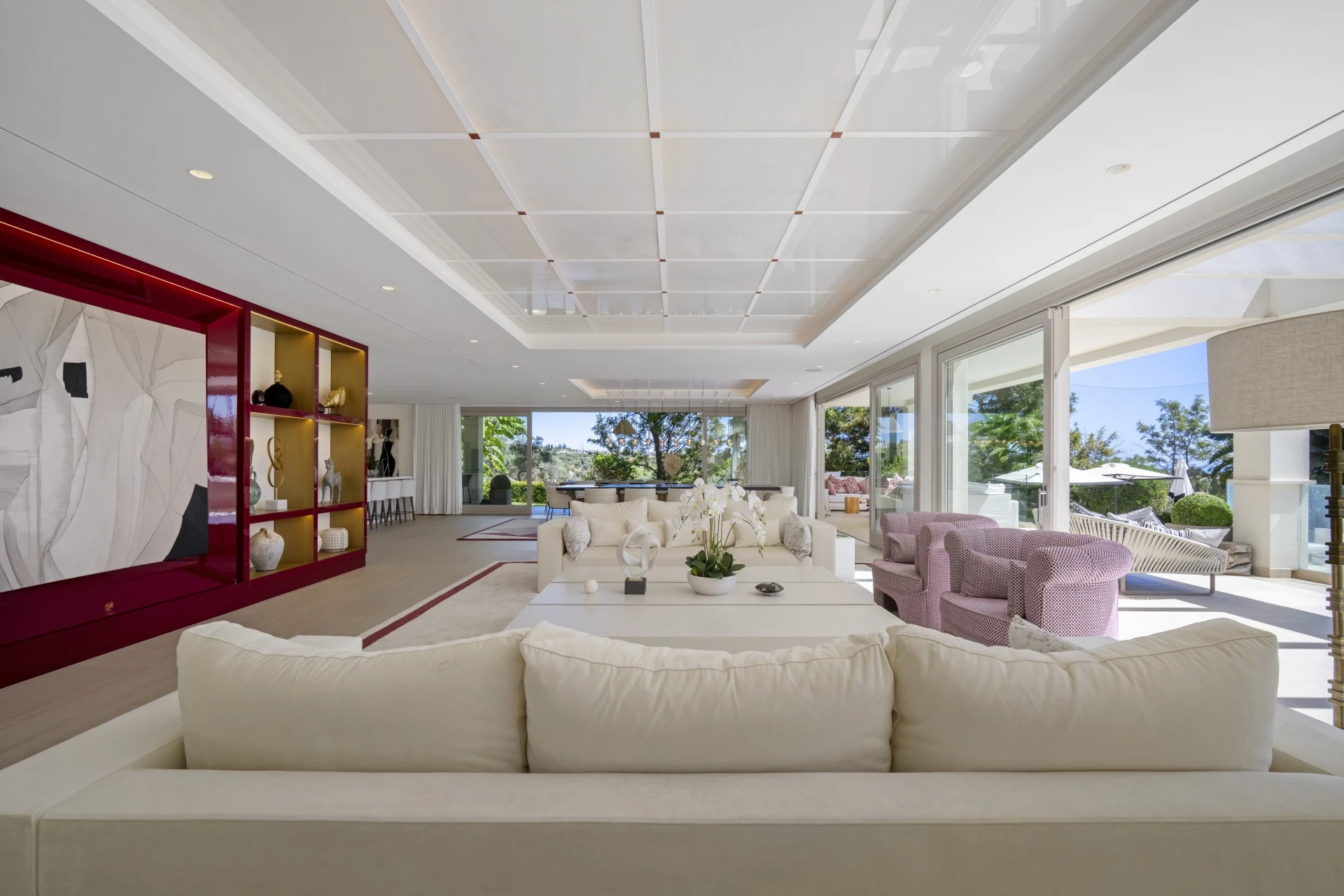 Bright living room opening onto the garden terrace