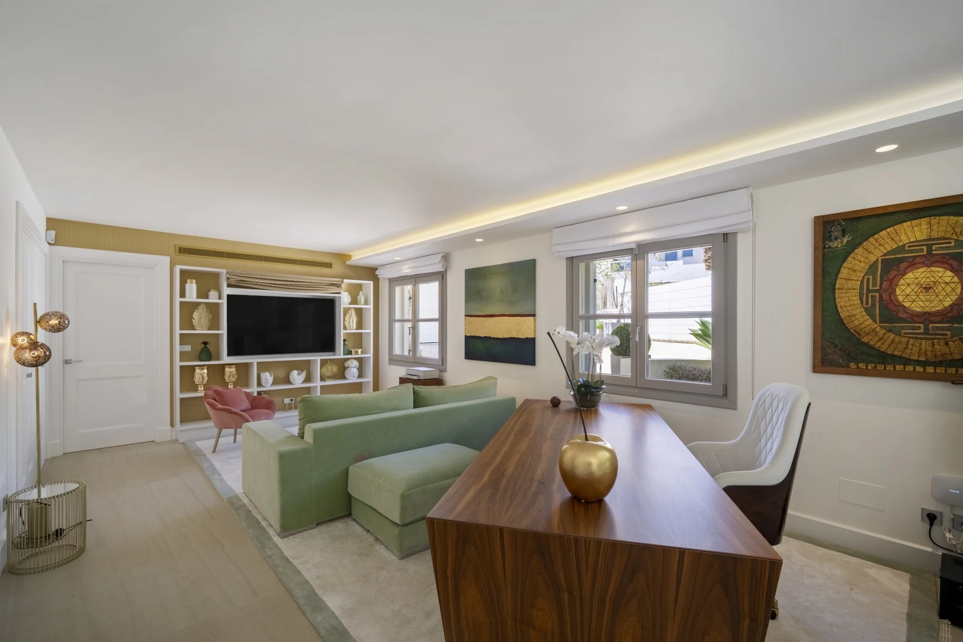 Lounge with television and built in shelving