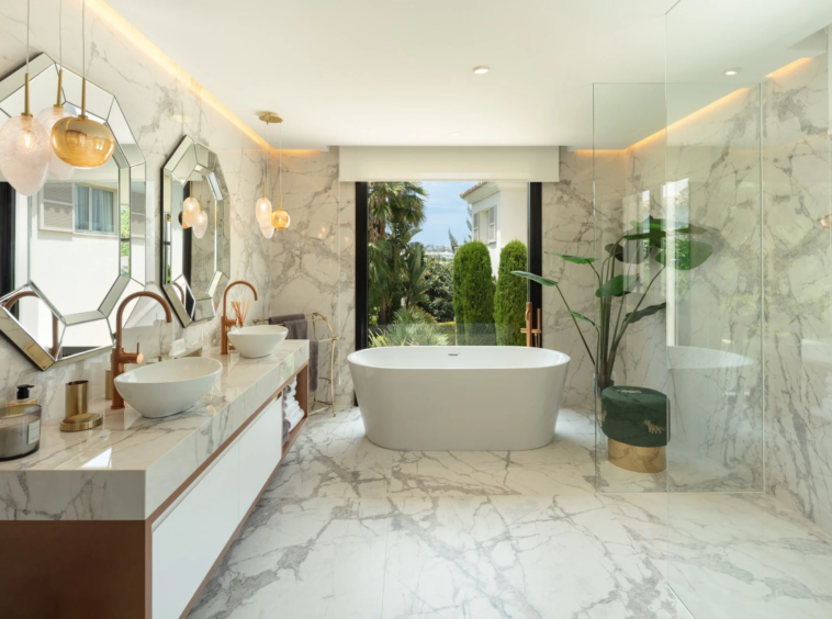 Principal bathroom with freestanding bath and twin basins