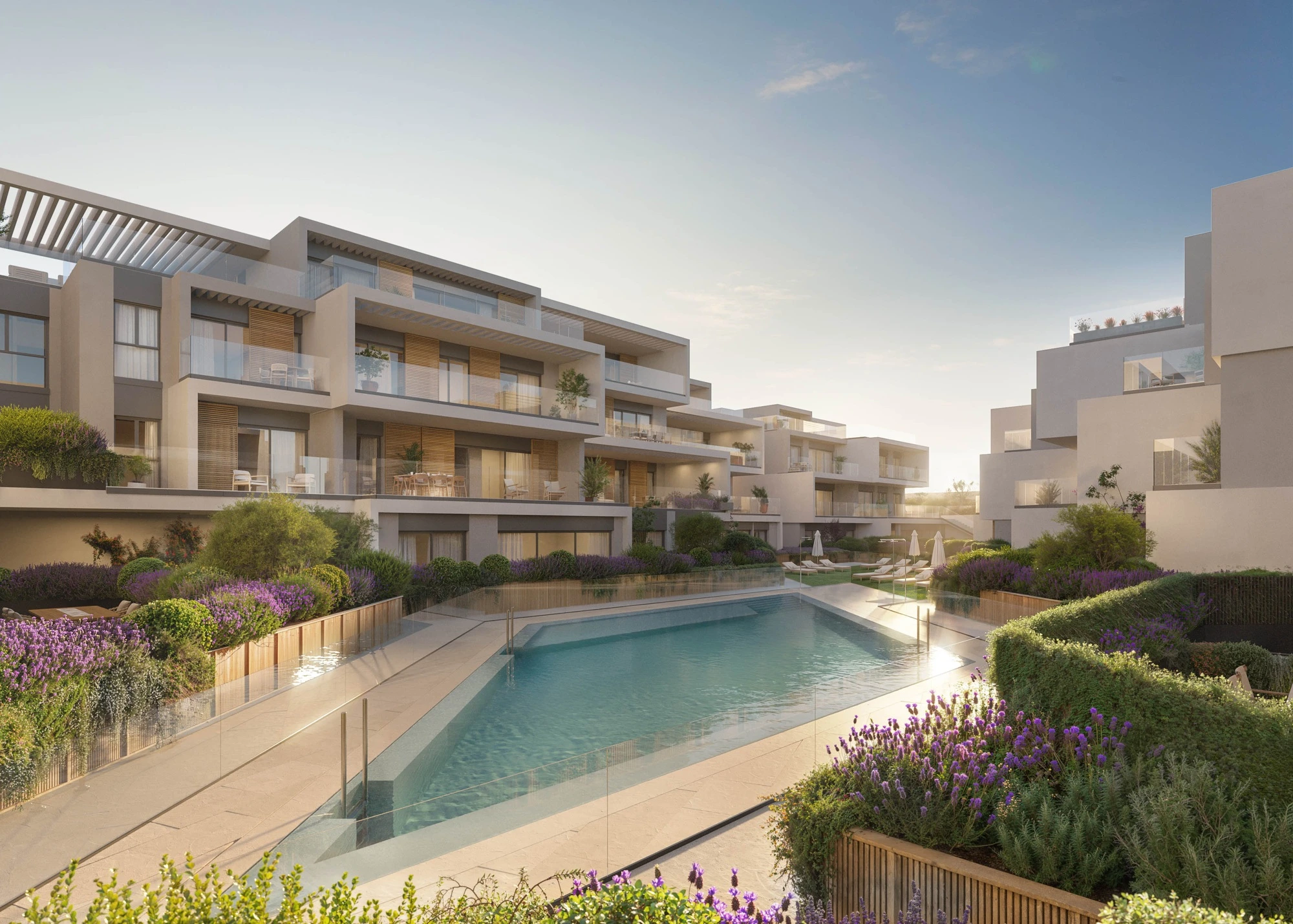 Shared outdoor swimming pool and landscaped gardens