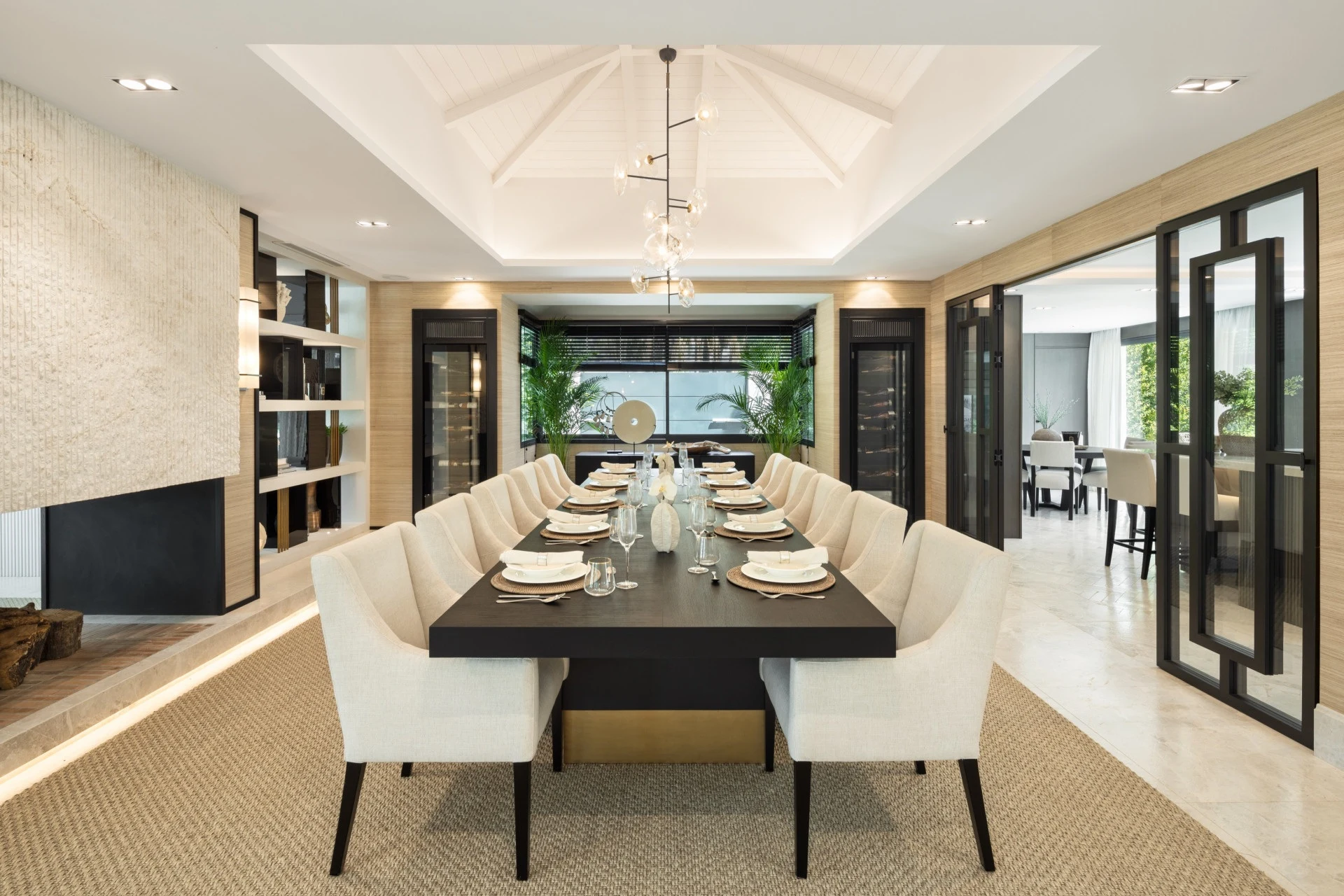 Dining room with a long table and garden-facing windows