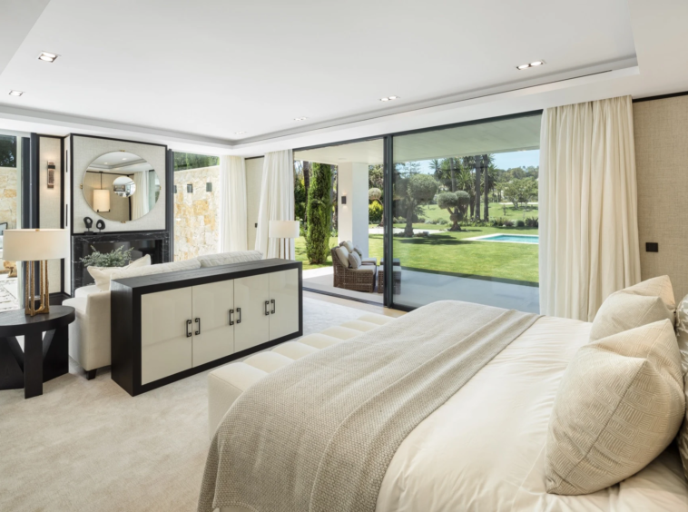 Bedroom suite with terrace access and views of the garden