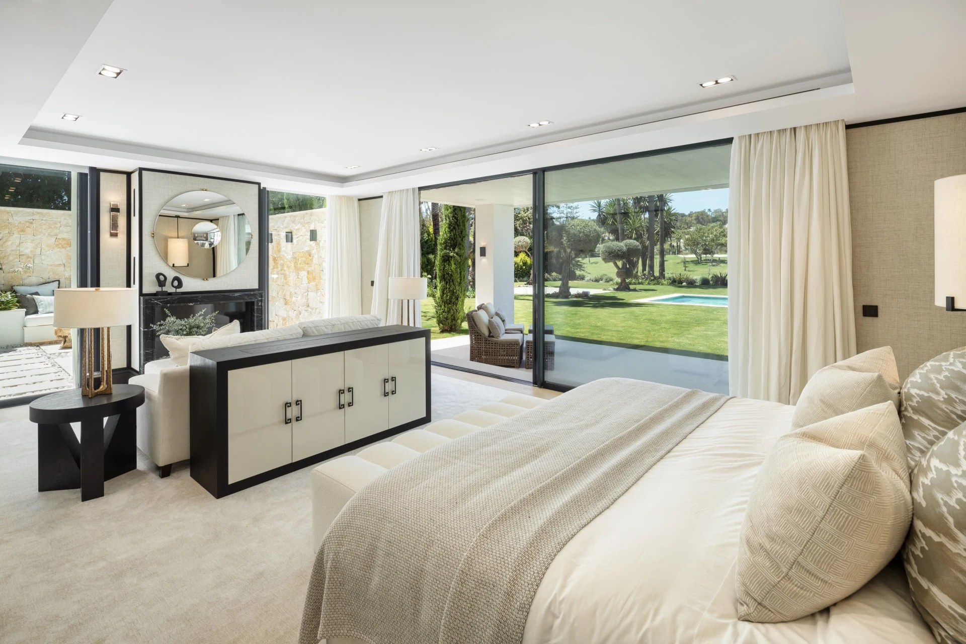 Bedroom suite with terrace access and views of the garden