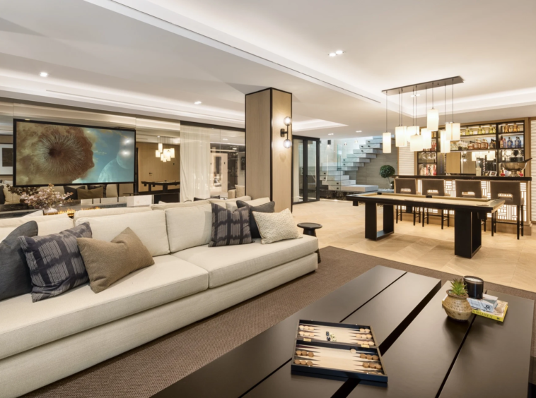 Entertainment lounge with seating area and bar