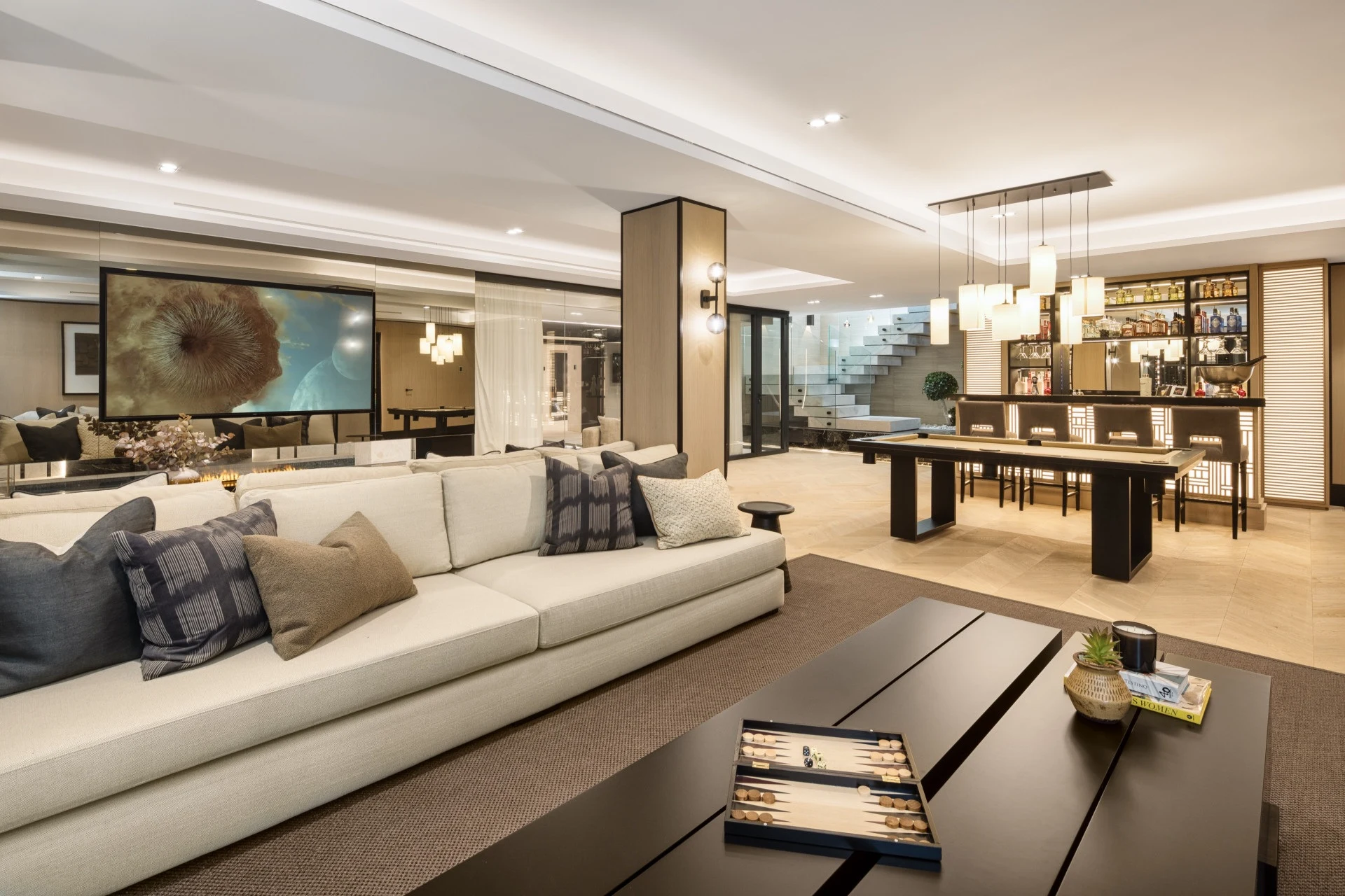 Entertainment lounge with seating area and bar