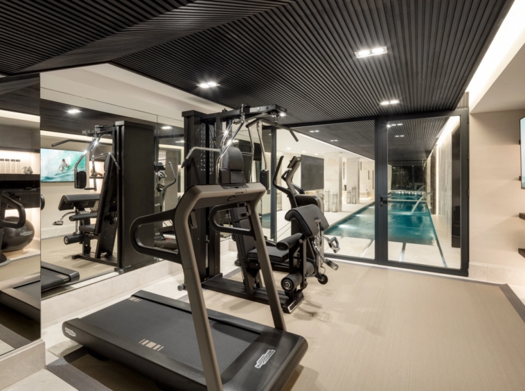 Private gym beside the indoor swimming pool
