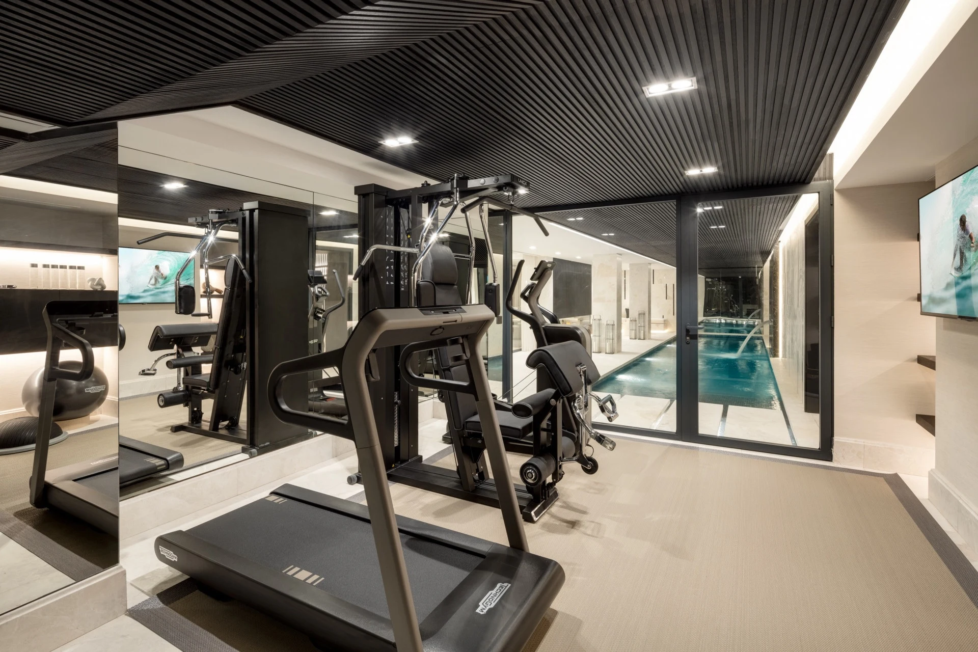 Private gym beside the indoor swimming pool