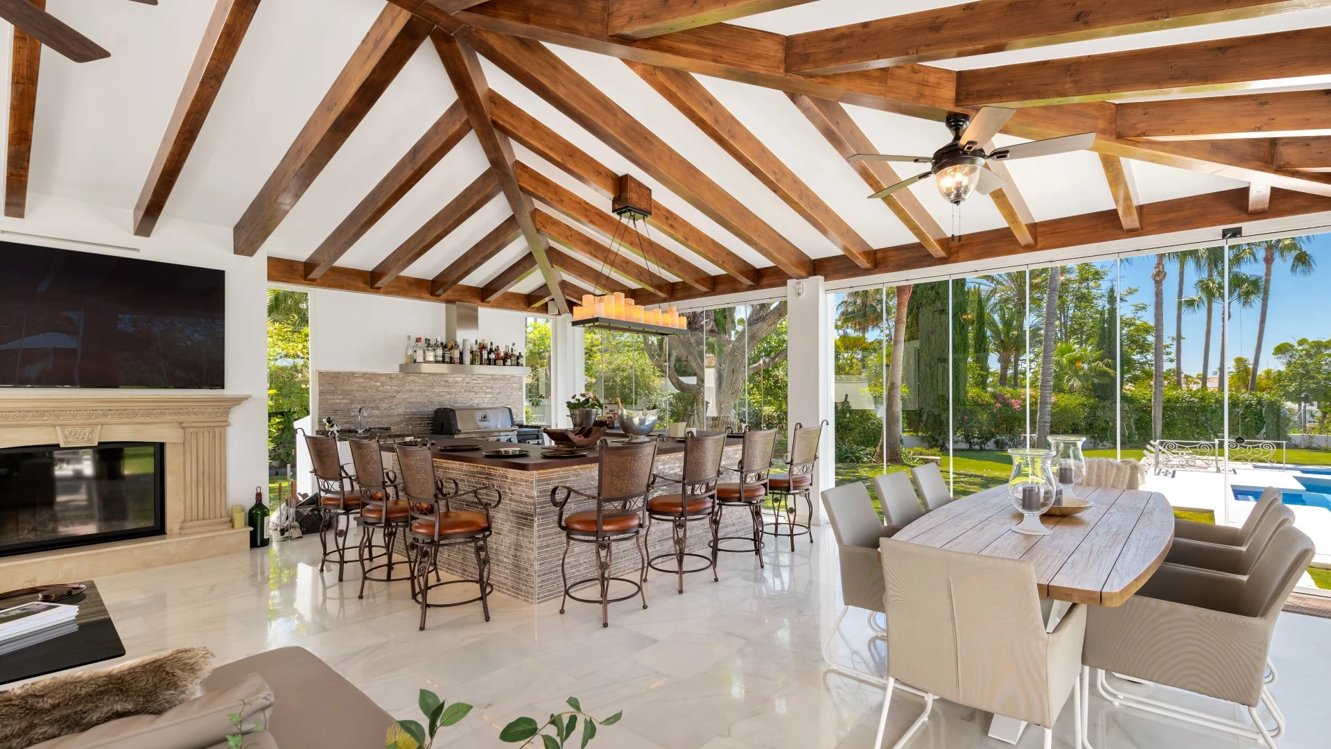 Bright lounge and bar beneath a timber-beamed ceiling