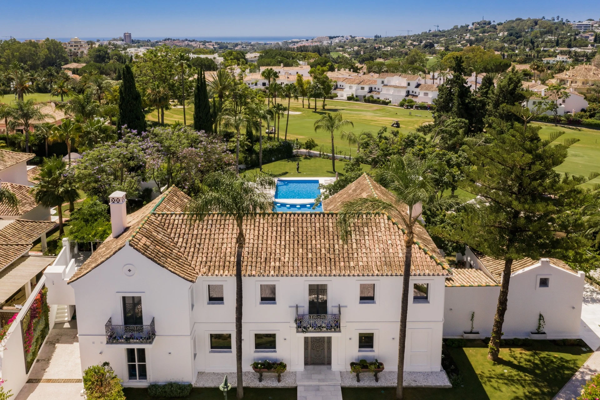Rear view of the villa beside the neighbouring golf course