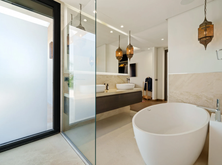 Bathroom with freestanding bathtub and walk-in shower