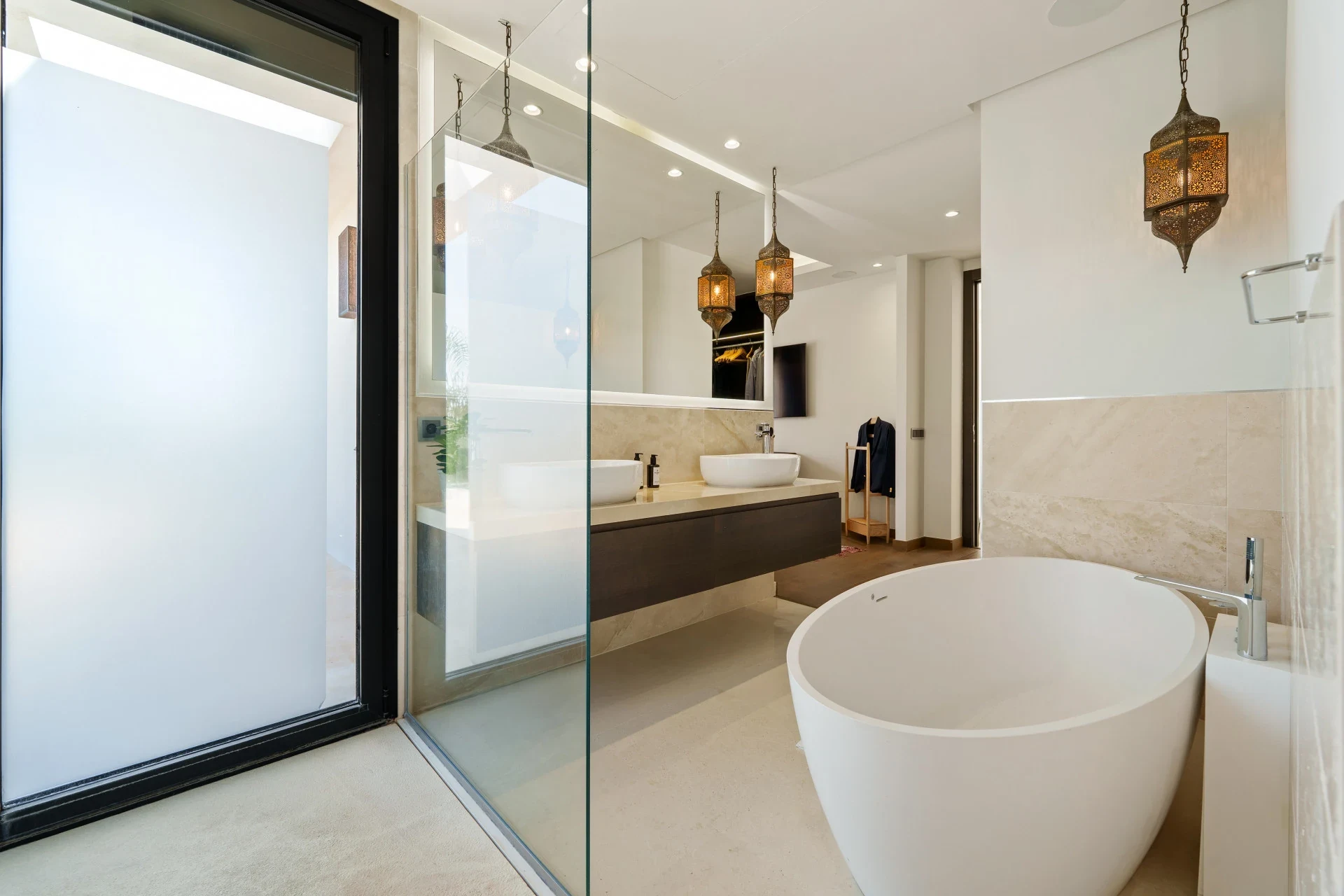 Bathroom with freestanding bathtub and walk-in shower