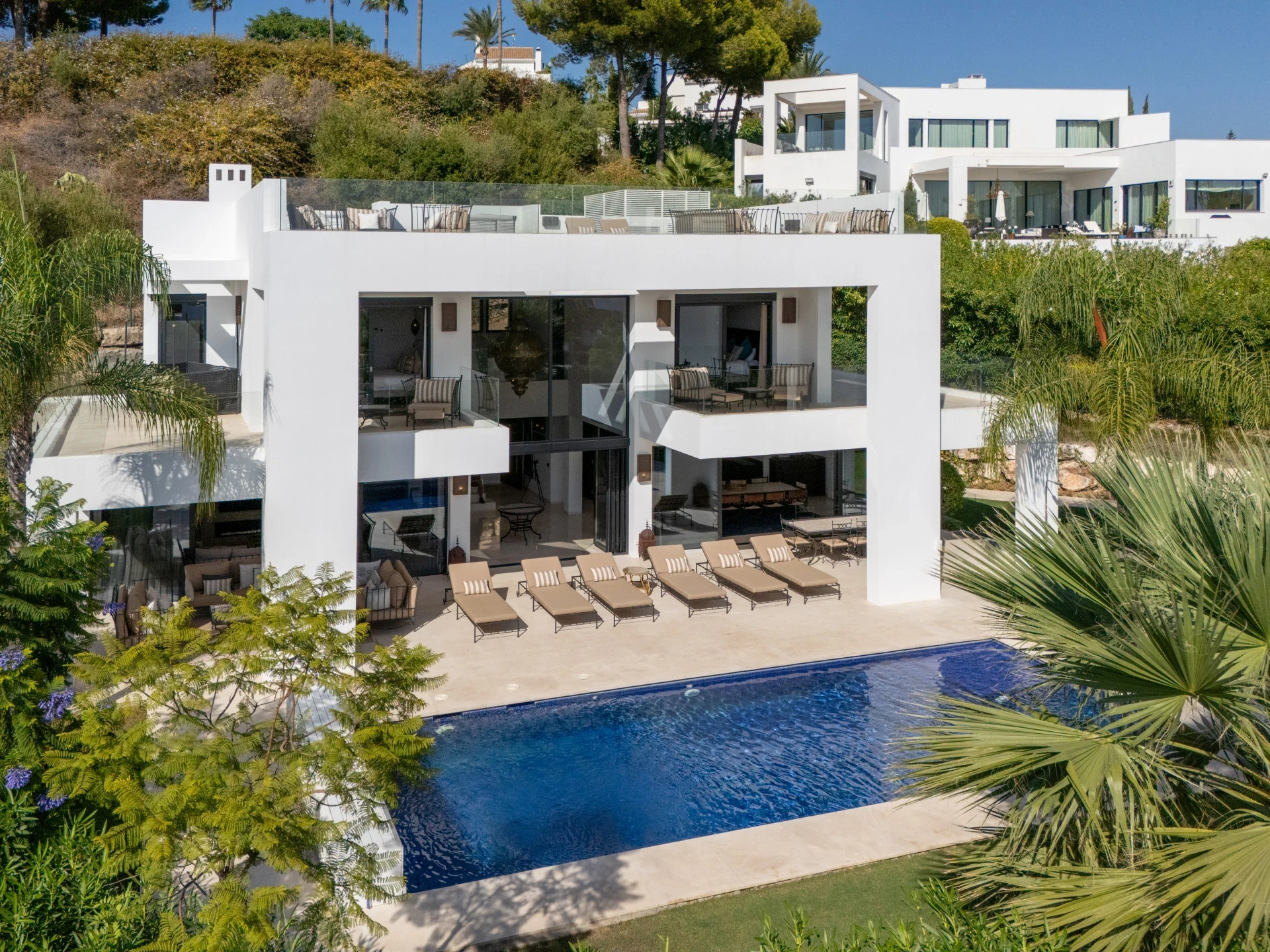 Elevated view of the villa, garden and swimming pool