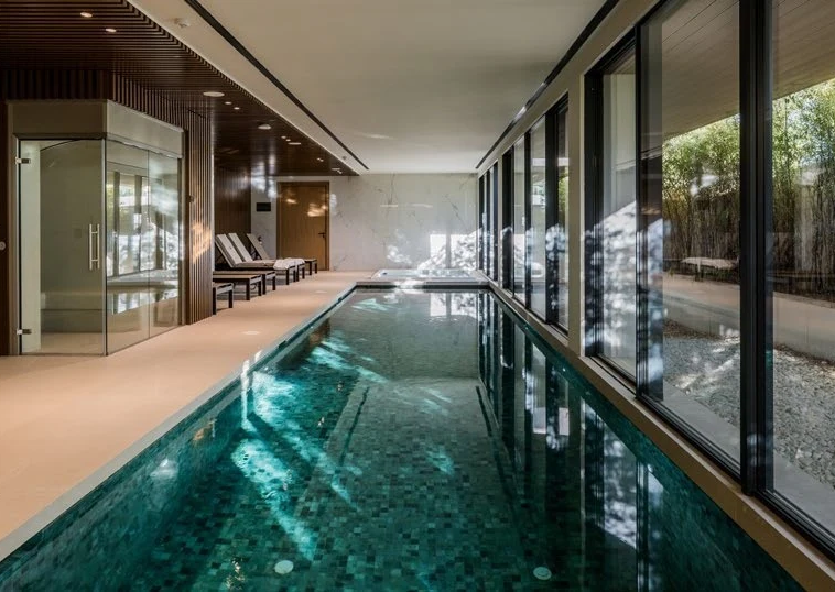 Communal heated indoor pool and spa