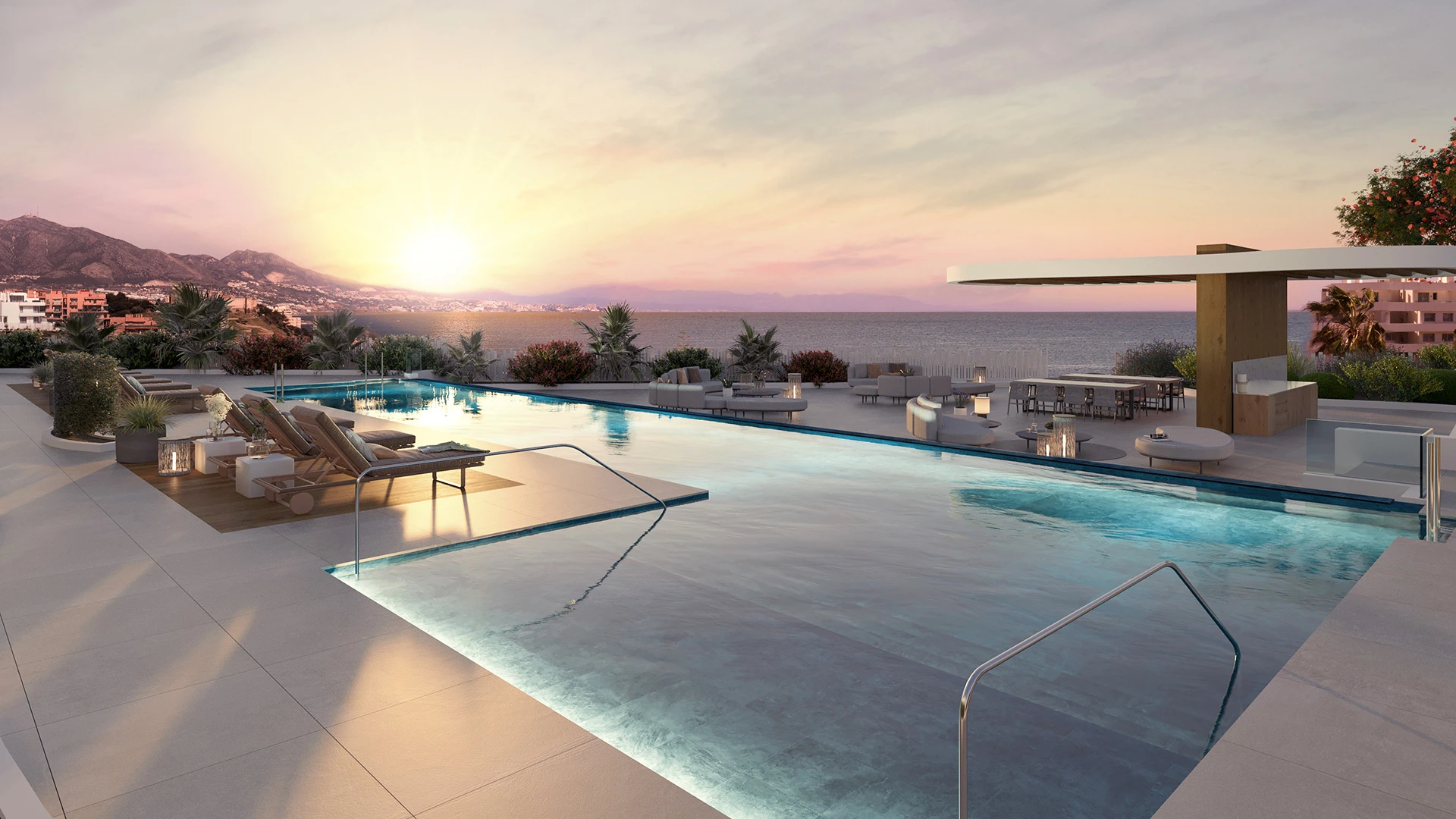 Shared outdoor pool at sunset in a coastal residential community