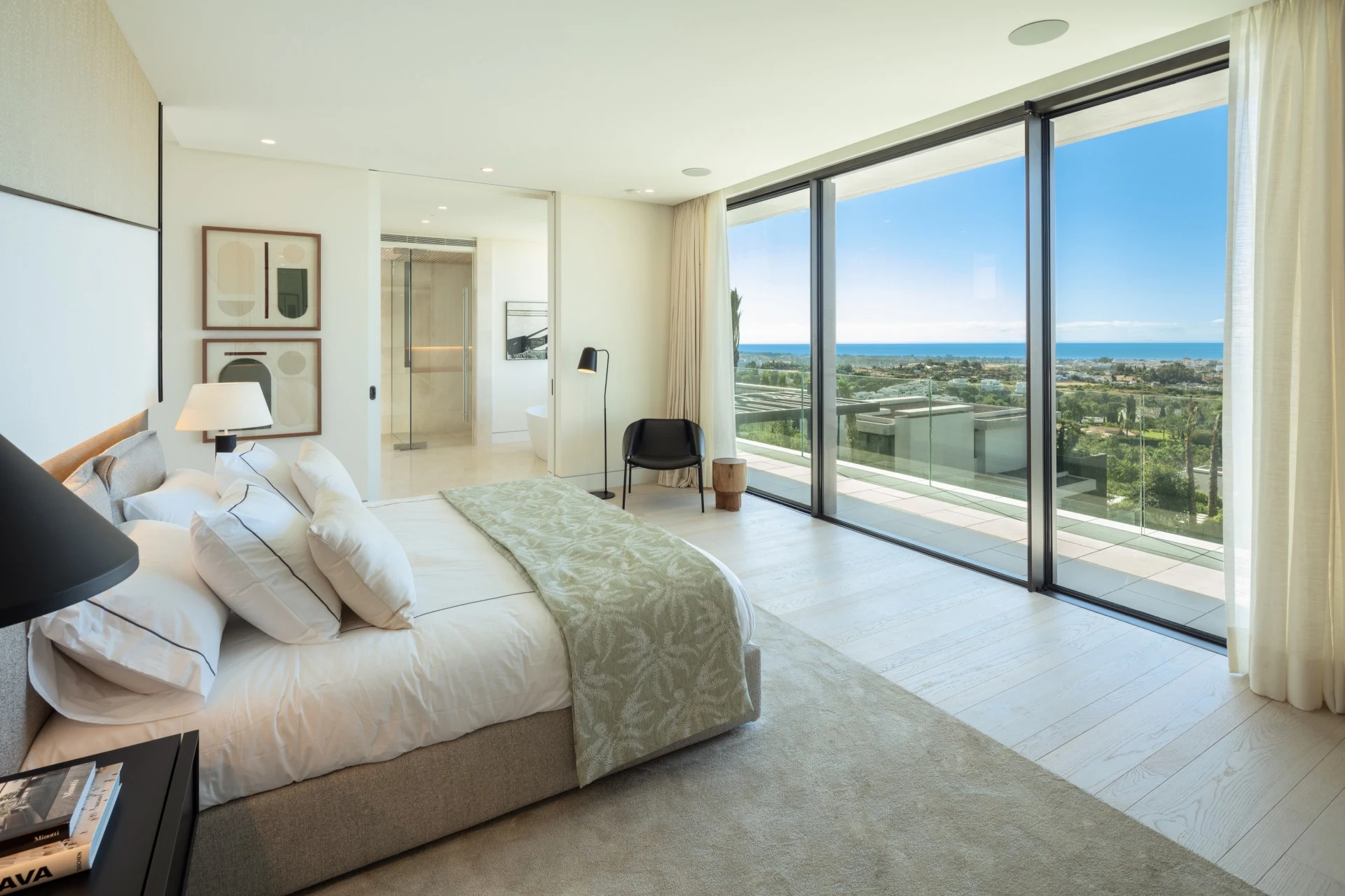 Principal bedroom with a private terrace and sea views